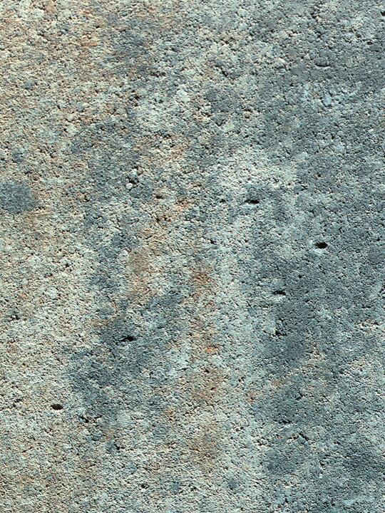 Grau-beige Betonoberfläche mit feiner Textur Detailansicht einer strukturierten Betonoberfläche in Grautönen